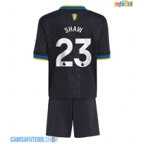 Camisa de time de futebol Manchester United Luke Shaw #23 Replicas 3º Equipamento Infantil 2025-26 Manga Curta (+ Calças curtas)